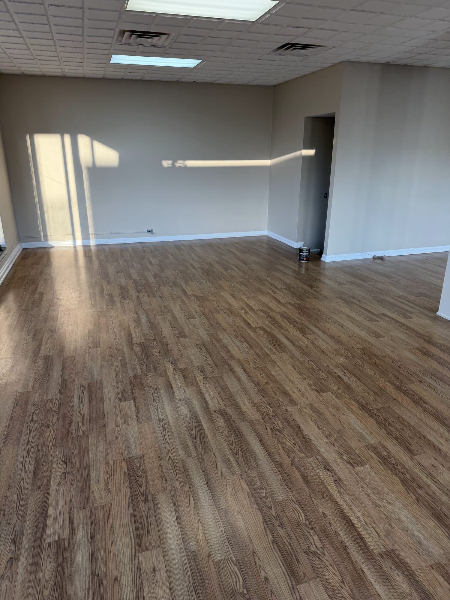 Finished commercial interior with painted walls and white trim